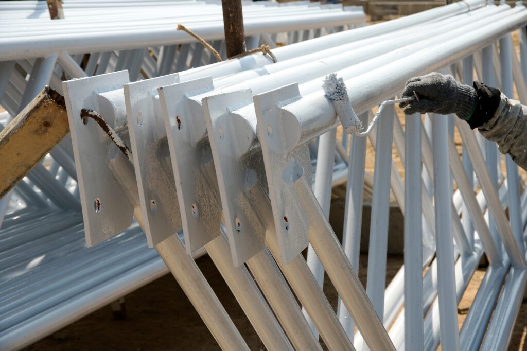 labor was painting color to carbon steel on site construction